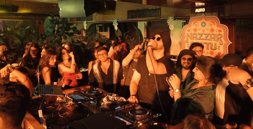 DJ Sahib performing amid the crowd at Nazzar Battu